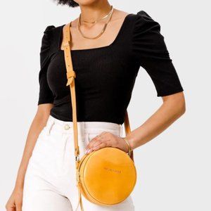 Leather crossbody circle bag in sunflower by Portland Leather